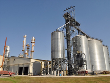 The GTEC ethanol plant exterior, with distillation columns and grain storage silos