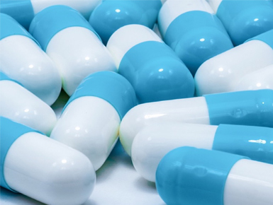 Vitamin capsules in production